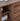 Sculpted Low Flat and Long Walnut Wood Bookcase
