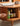 Elysium Oval Blinds Rolling Door Cherry Wood Coffee Table