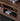 Charming Red Brick Inspired Solid Walnut Wood TV Stand