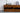 Zen Open Wave Monkey Pod Wood TV Stand