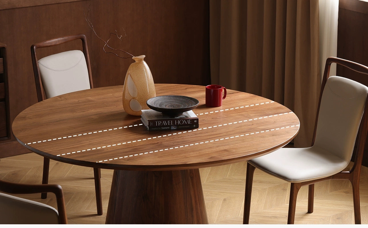 mesa de comedor redonda con acabado en madera de nogal