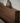 Made-to-order Floor Form low platform bed frame in walnut finish, showcasing sleek design and sturdy construction.