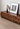 Solid Made sculpted walnut wood TV console cabinet, made to order with sleek modern design and natural wood finish.