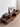 Solid Made sculpted walnut wood TV console cabinet, made to order with a sleek, modern design and natural wood finish.