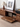 Made to order Solid Made sculpted walnut wood TV console cabinet with sleek, modern design and natural wood finish.