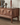 Epic walnut wood TV stand with geometric drawer fronts, made to order, showcasing sleek natural wood grain and modern design.