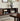 Made to order Core Haus Mid-Century Walnut TV cabinet with tambour doors, showcasing sleek design and natural wood finish.