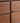Made to order Minimalist Walnut Wood TV Stand with four spacious drawers, sleek design for modern living rooms.