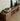 Elegant walnut modern TV stand by Solid Made featuring a glass storage cabinet and sleek design for contemporary living rooms.