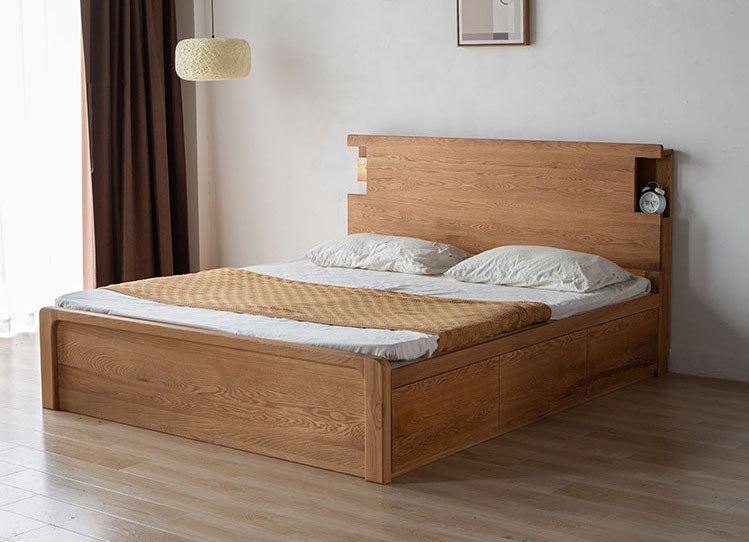 letto idraulico con vani portaoggetti realizzato in legno di rovere