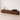 Made to order Solid Made Sculpted Walnut Wood TV console cabinet with sleek, modern design and smooth finish.