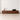 Made-to-order Solid Made sculpted walnut wood TV console cabinet with a sleek, modern design and smooth finish.