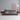 Made to order Earth Frame upholstered platform bed with walnut finish, featuring a modern design and plush fabric upholstery.