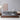Made-to-order Earth Frame upholstered platform bed with walnut finish, showcasing a sleek, modern design with plush fabric upholstery.
