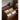 Contemporary walnut wood nightstand by Black Solid, made to order, featuring clean lines and a smooth surface for modern bedroom decor.