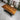 Rustic coffee table made from South African walnut and monkey pod wood slab, showcasing natural wood grain and live edge detail.