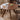 Made to order Circle of Life Walnut Wood Dining Table showcasing its round design and rich wood grain.