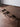 Made to order Citrine American Black Walnut wood desk with turned legs, showcasing a sleek and sturdy workspace design.
