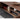 Made to order Black Walnut Wood TV stand with modern waveform design by Dark Arts, featuring sleek, stylish storage for entertainment systems.