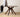 Made-to-order Earthy black walnut wood round table with four sturdy legs, showcasing natural wood grain and smooth finish.