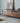Made to order Fable solid walnut wood TV stand with mountain design, showcasing sleek craftsmanship and natural wood grain.