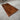 Fallen brown Congo walnut wood slab table by Fylven featuring a live edge and epoxy resin finish, showcasing natural wood grain.