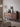 Black walnut wood sideboard with six drawers, modern Glamour Multi-Drawers design, featuring sleek black finish and stylish storage.