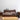 Waning crescent walnut wood bed by Grove Moon, made to order, showcasing smooth curves and natural wood grain details.
