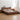 Made to order Grove Moon Waning Crescent Walnut Wood Bed with a sleek crescent shape and smooth walnut finish.