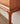 Made to order Oasis Antique solid cherry wood console table with four drawers, showcasing elegant craftsmanship and natural wood grain.