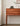 Made-to-order Oasis Antique console table with four drawers in solid cherry wood by Laundra, showcasing a classic antique design.