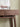 Made-to-order Lravexis Symphony 3 Drawers Hallway Table with sleek wood finish and modern design, shown in a stylish hallway setting.
