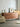 Serenity Natural Black Walnut Wood Finish Credenza by Noir Craft, featuring six wood options and sleek storage design.