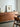 Black walnut wood finish credenza by Noir Craft, featuring sleek design and six wood options, ideal for modern storage solutions.