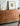 Noir Craft Serenity natural black walnut wood finish credenza with six wood options, showcasing sleek storage design and elegant craftsmanship.