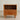Made to order artisan crafted round cherry wood bedside table by Timbera with smooth finish and natural wood grain.