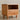 Made to order Timbera cherry wood bedside table with round legs, artisan crafted for a stylish bedroom accent.