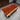 In-stock Urban Slab African Bubinga wood table with a live edge, showcasing rich grain and warm tones on a sturdy tabletop.