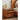 Made-to-order Woodhaven cherry wood nightstand with stylish glass drawers, featuring a sleek and modern design.