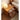 Made-to-order Woodhaven cherry wood nightstand with stylish glass drawers, featuring a modern design and smooth finish.